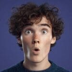 scroll-stopping shocked face, cinematic close-up, youtube thumbnail